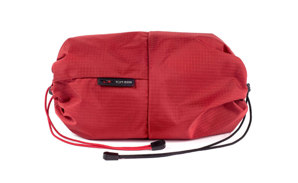 An Aeronaut 30 Travel Laundry Stuff Sack in Sangria (red with light red grid) 210 Cerylon.